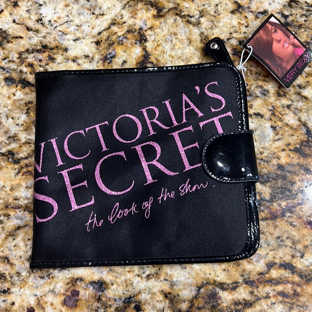 Victoria Secrets foldable travel makeup bag.